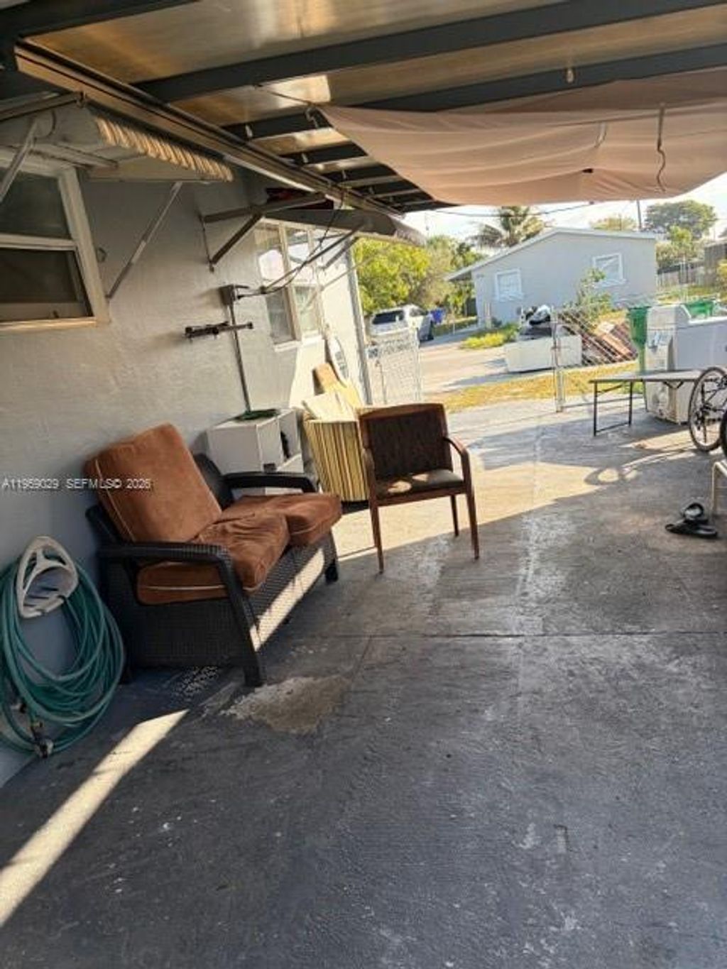 Photo of 1913 SW Gardenia Rd, Fort Lauderdale, FL 33317 (MLS # A11959029)