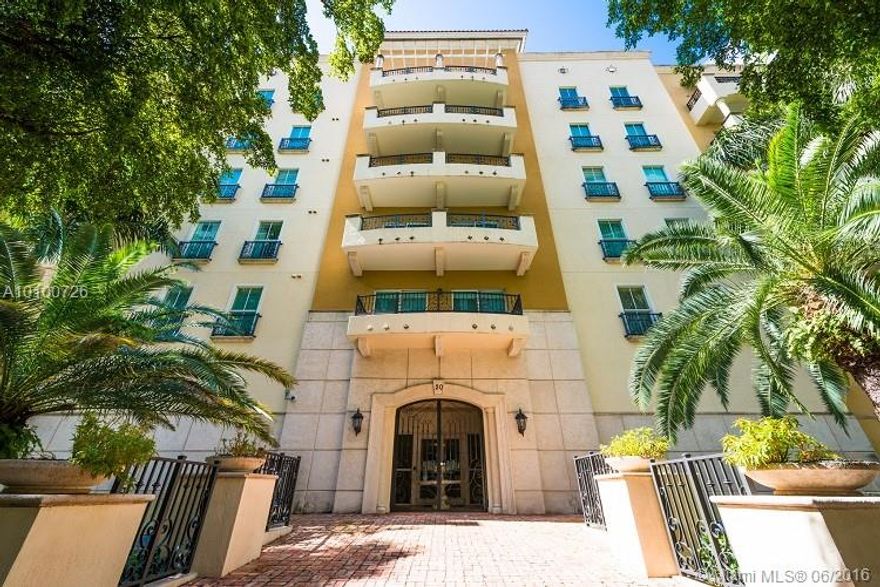 Elegant 35 unit Boutique building near Douglas Entrance. Elegant and tastefully decorated unit with high end furniture, designer kitchen cabinets, split bedroom plan, high ceilings, laminate flooring, washer/dryer inside unit, crown moldings, great views from balcony facing Coral Gables and Coconut Grove, beautiful party terrace on 2nd floor, community pool,2 assigned parking spaces, no smoking and no pets. Renter's Insurance required.