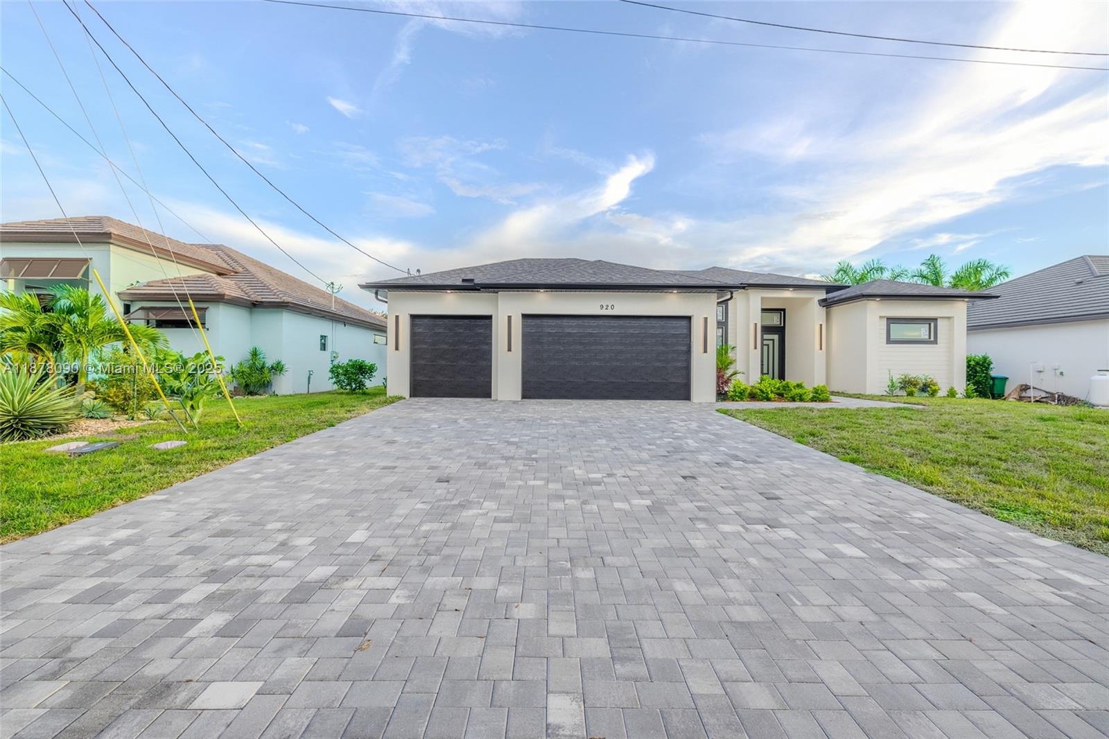 Luxury Waterfront New Construction Home in Cape Coral, BEST Opportunity to get an amazing Seller credit for buyer's closing costs. This stunning 4-bedrooms, 3-bathroom residence with 3,295 SQ. FT. Total offering the perfect blend of elegance, comfort, and Florida waterfront living. Has been custom built to perfection with meticulous attention to detail, thoughtful design, and numerous luxurious upgrades throughout. High tray ceilings with open concept design that integrates the living, dining, and kitchen areas. Easy access to Del Prado, Santa Barbara, Pine Island Rd, and Veterans Pkwy. Just minutes from some of Southwest Florida's most beautiful beaches- ideal for consistent income and long-term value. Strong Airbnb Investment Opportunity