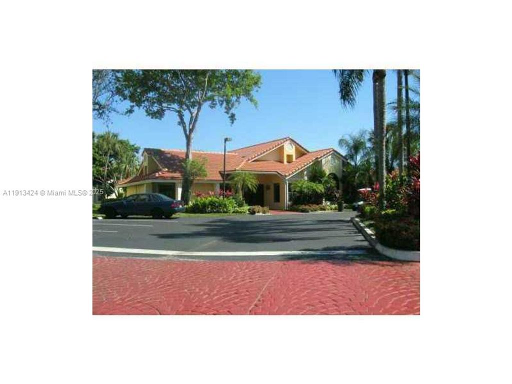 Photo of 10125 W Sunrise Blvd #106, Plantation, FL 33322 (MLS # A11913424)