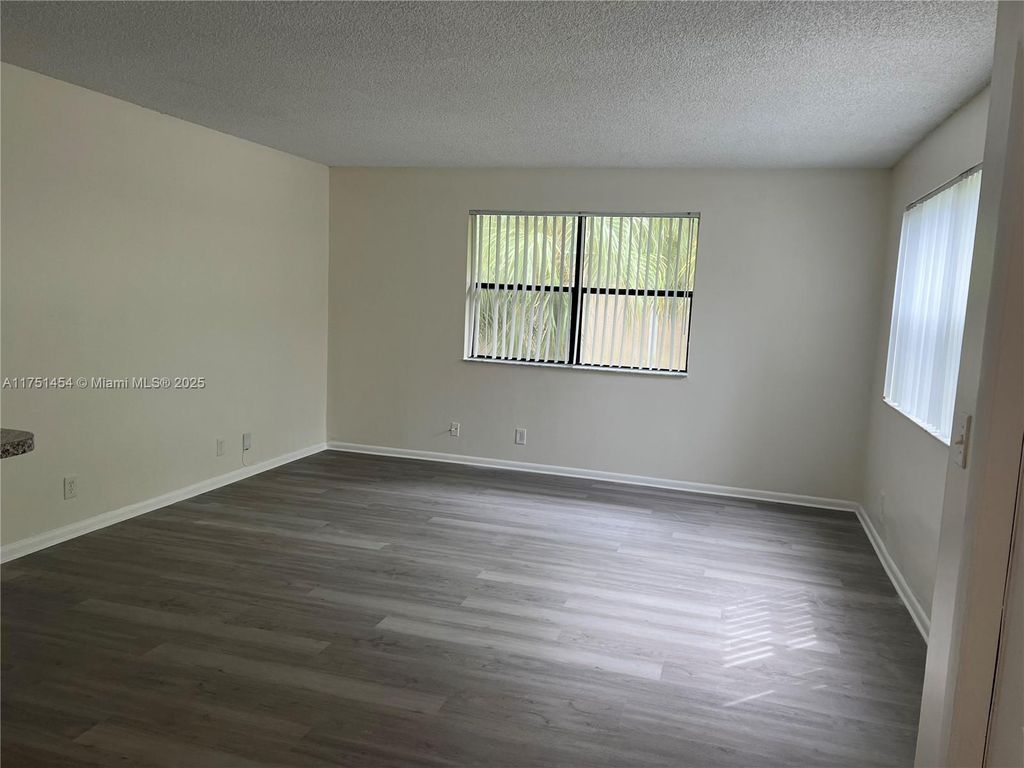 Photo of 11633 Royal Palm Blvd #11633, Coral Springs, FL 33065 (MLS # A11751454)