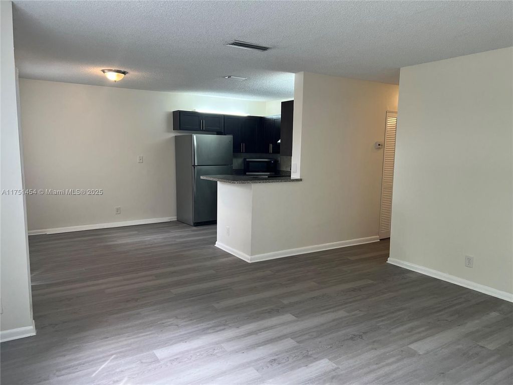 Photo of 11633 Royal Palm Blvd #11633, Coral Springs, FL 33065 (MLS # A11751454)