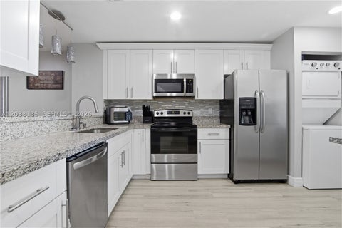 Photo of 2882 Coral Springs Dr #2882, Coral Springs, FL 33065 (MLS # A12038185)