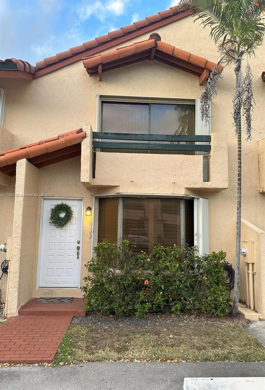 Amazing Townhome in the gated community of Dadeland Cove sitting between Dadeland and Pinecrest. Home features a modern renovated master bathroom, granite kitchen with plenty of cabinetry, wood laminate flooring throughout, intimate dining room area, spacious bedrooms, open attic space for storage and a cozy fenced yard. Includes 2 assigned parking spaces, visitor parking spots, a sparkling community pool, and well-maintained common areas. The roof is new, only 2.5 years old. The neighborhood is an ideal place for all, providing 24-hour gated security. Pets allowed neighborhood. Close distance to parks, schools, and shopping. HOA dues includes exterior home insurance, cable service, 24/7 Virtual Security, landscaping, roof maintenance/repairs, pool service, and pest control.