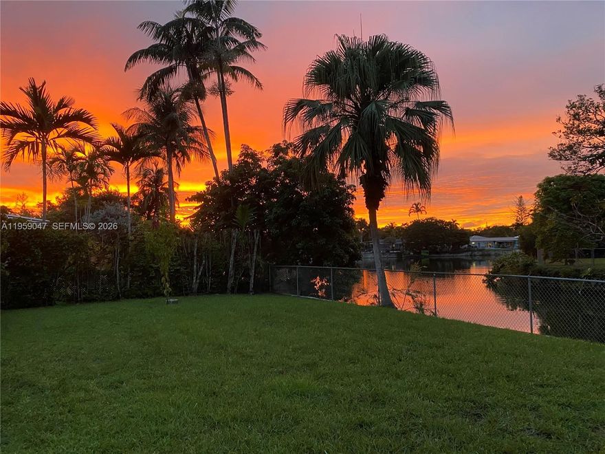 Loved and cared for by one family for over 30 years, this home is ready for its next chapter—an opportunity not to be missed! This charming 4-bedroom, 3-bath residence is nestled along a canal with a private boat dock. Ideal for those who value the peace and quiet of South Miami while enjoying an urban lifestyle, the home is minutes to Trader Joe’s, Aldi, Milam’s, Sunset Place, UM, and Baptist Hospital. Added benefit is a detached 576 sqft. guest cottage with a private entrance and kitchenette—perfect for in-laws, guests, or a college student. Brand new impact windows throughout! Yes, you can even dock a small boat. Come experience the sunset for yourself.