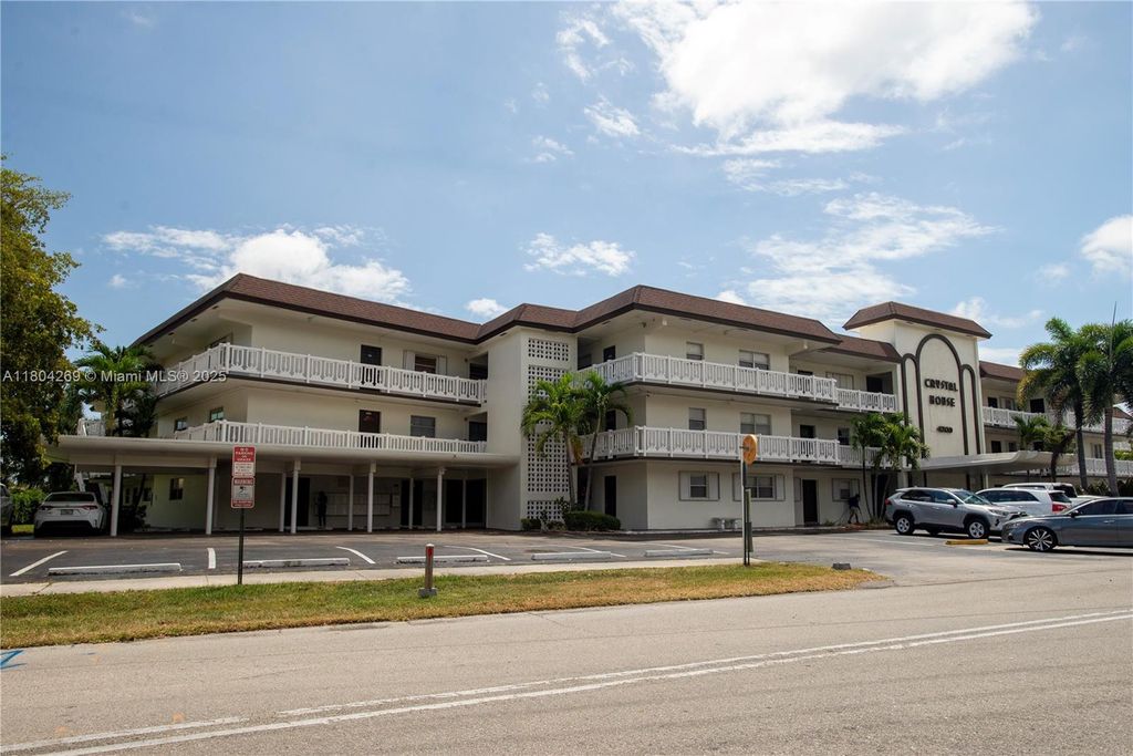 Photo of 4200 Crystal Lake Dr #204, Deerfield Beach, FL 33064 (MLS # A11804269)