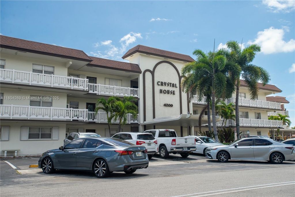 Photo of 4200 Crystal Lake Dr #204, Deerfield Beach, FL 33064 (MLS # A11804269)