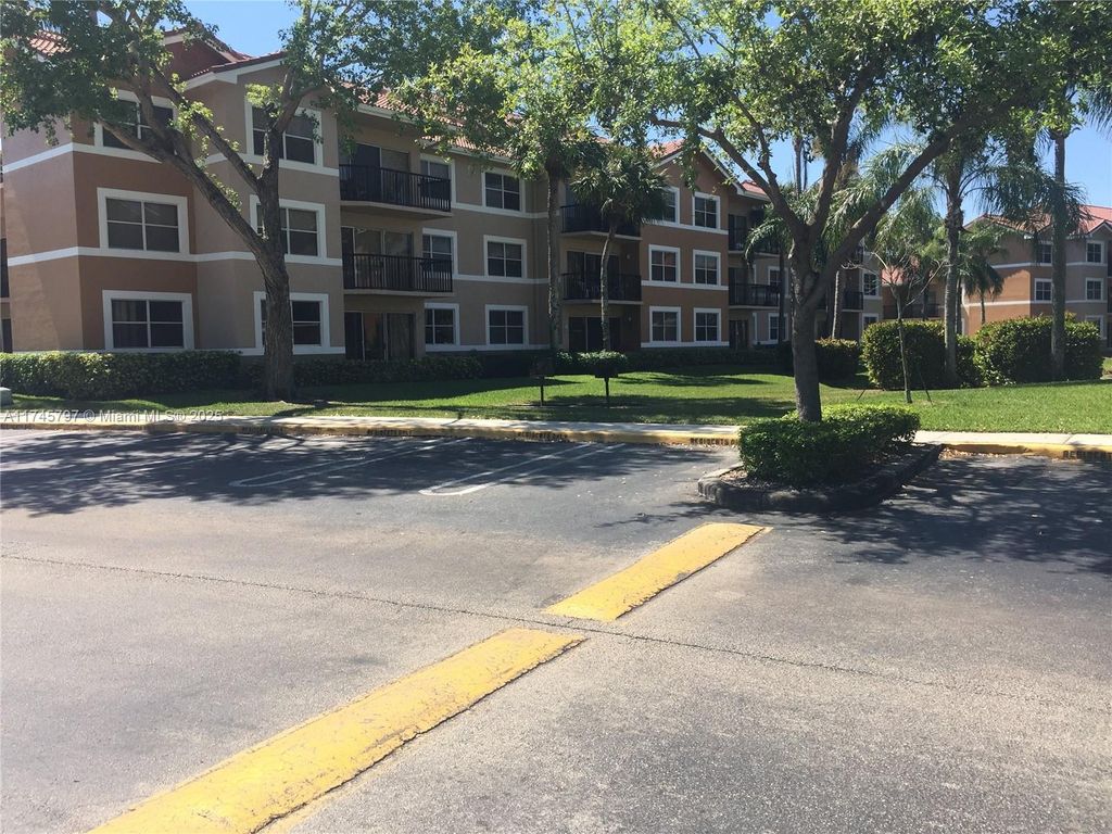 Photo of 9055 Wiles Rd #308, Coral Springs, FL 33067 (MLS # A11745797)