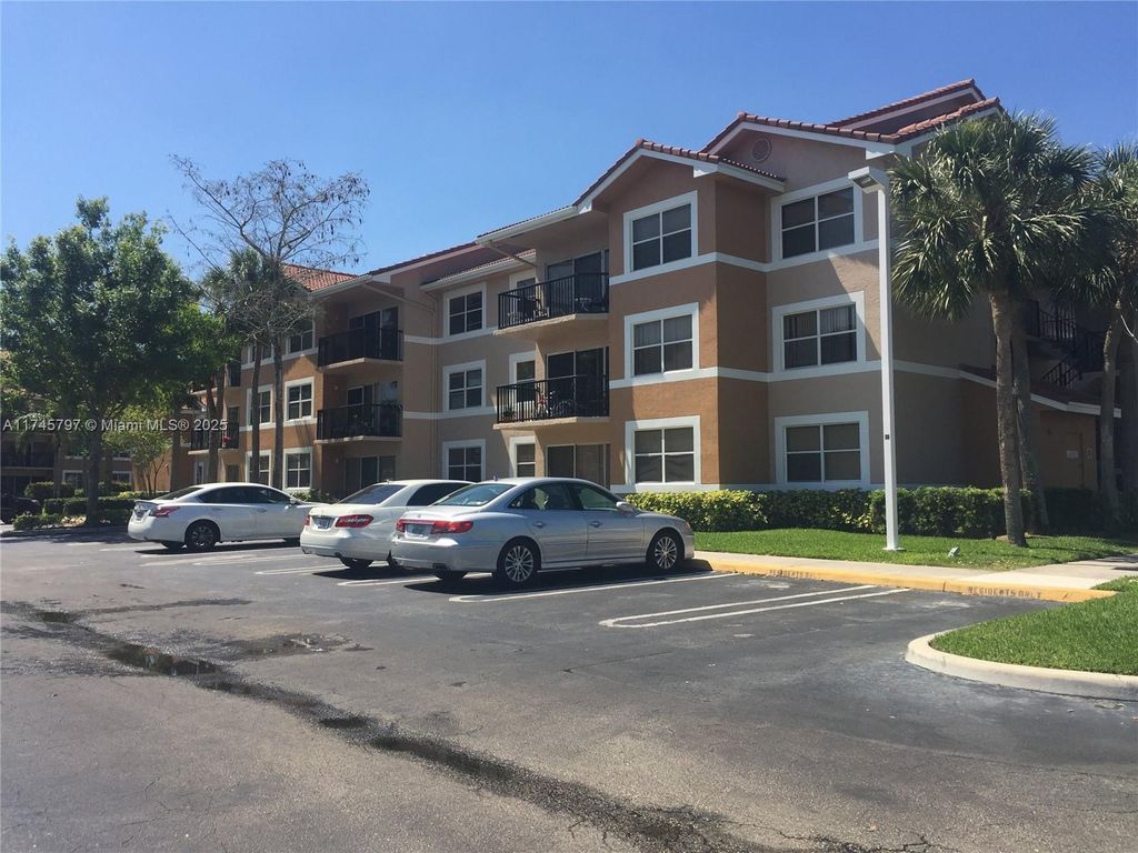Photo of 9055 Wiles Rd #308, Coral Springs, FL 33067 (MLS # A11745797)