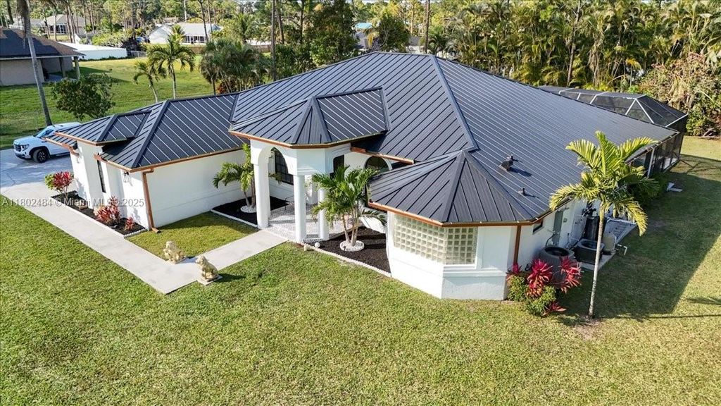 Photo of 12667 N 79th Ct N, Loxahatchee, FL 33412 (MLS # A11802484)