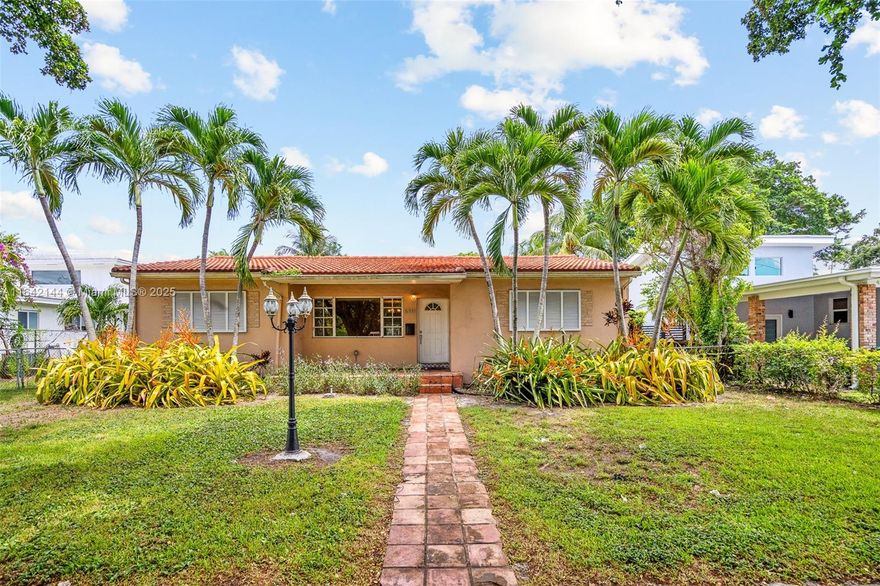 3-bed, 2-bath home in a prime South Miami location on a spacious 10,575 SqFt lot. The property features a living/dining area, a large family room with a built-in fireplace and access to a screened porch, and a kitchen with stainless steel appliances and granite countertops. Hardwood flooring is found in the living area and bedrooms. The home also includes a versatile, air-conditioned detached building, perfect for use as a garage or office. Main tile roof (2018), Flat roof (2016), water heather (2022). Enjoy a huge backyard with fruit trees and plenty room for a pool. Conveniently located, this property offers close proximity to parks, a variety of shops and restaurants, malls, a golf course, schools, and University of Miami.