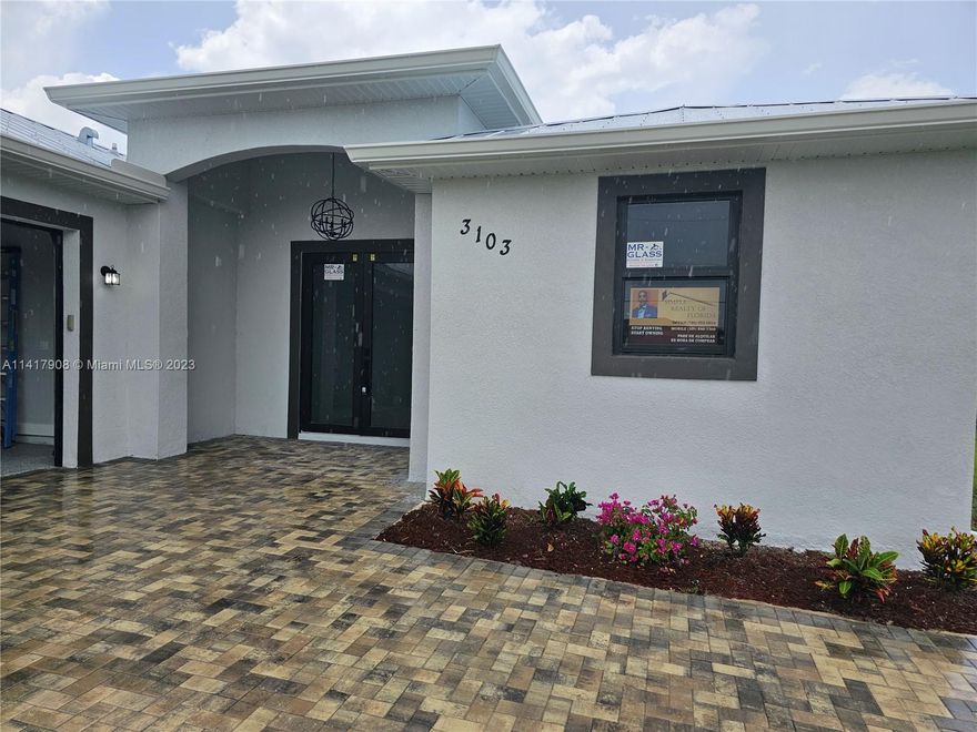 "HIGHLY DESIRABLE AREA OF LEHIGH" When it comes to new construction, you don't want to miss out on this opportunity. "Florida living at its best" 
Cinder block home, offering 3 bed 2 bath and good lot.
Open concept with split bedroom plan, which maximizes the use of space with tile throughout the home, granite counter tops, stainless steel kitchen appliances, impact resistant windows and doors, sprinklers around the hose, also with a metal roof.
This home is located in the rapidly growing area of Lehigh Acres. It will not last long. "Hablamos Español"
"Seller contribute with $5,000 closing cost help"