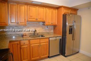 GREAT FOR INVESTORS CAN BE RENTED RIGHT AWAY! THIS UNIT IS READY TO MOVE IN. Corner condo with 2 bed and 2 baths in Lakeview Aventura Gated community. All the rooms are well iluminated by natural light. The Dinning and living area combined with a view to an enclosed balcony with partial lake view. Updated kitchen and guest bathroom. The main room has double walk in closets, double vanity and bathtub with full washer and Dryer units inside. You can enjoy from the room the outside views and relaxing on the balcony. The unit has one parking assigned and lot of guest parking, A community pool with water view and a sidewalk to enjoy the nature around the neighborhood. Great location minutes away Aventura Mall, Tenant Occupied. A/C and water heater 2014.