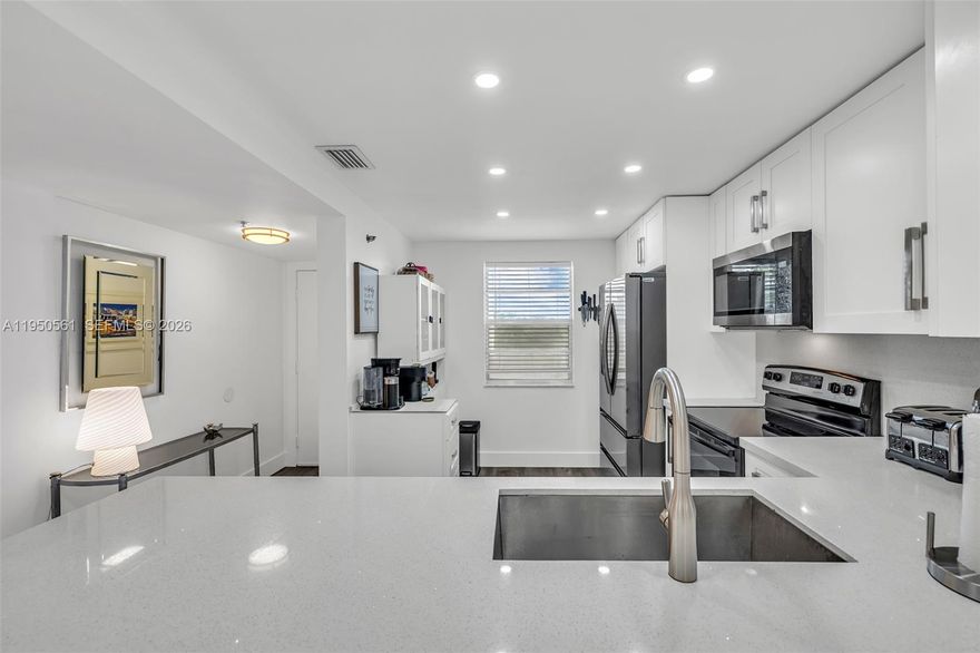 This is a must see, Fantastic opportunity in this Totally renovated 2 bed 2 bath oversized Condo. The moment you enter you will see the updated stylish modern look . Stunning quartz waterfall countertop, with square sink and gooseneck faucet ,new white kitchen cabinets , new appliances , textured modern flooring additional cupboard and closet space, new AC new HWtank ,new washer and dryer just about everything here is new and updated.This fresh and bright home has an oversized terrace for all day relaxing with lucious garden view ,or enjoy all the great amenties including pickleball,tennis, Billiards or many other great activities and clubs.Centrally located  with Fine Dining and Quality shopping all close by. Association says 45000$ income needed 710 credit score and 20% Down Rentals allowed after 1 year