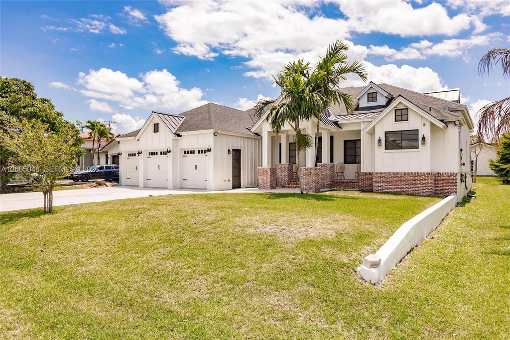 Photo of 11240 NW 23rd St, Plantation, FL 33323 (MLS # A12005048)