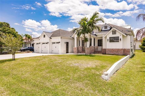 Photo of 11240 NW 23rd St, Plantation, FL 33323 (MLS # A12005048)