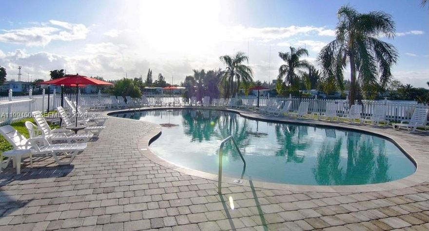 Welcome to Everglades Lakes, South Florida’s premier 55+ manufactured home community! Nestled within over 100 acres of lush tropical landscaping and serene lakes, this vibrant community offers a peaceful setting with native wildlife and a true sense of relaxation. This turnkey 2-bedroom, 2-bath home is move-in ready and perfectly located in one of the fastest-growing areas in South Florida. Enjoy unbeatable convenience—just 1 mile from the Florida Turnpike, 6 miles from Hard Rock Casino, and 9 miles from downtown Fort Lauderdale, with easy access to fine dining, world-class shopping, and entertainment. Everglades Lakes is a warm, close-knit community designed for active adult living, featuring:
24-hour manned gated security
Two swimming pools , Clubhouse & social activities, Billiards room, Shuffleboard courts, Waterside putting green
Pétanque courts, On-site laundry facilities.  Featuring laminate flooring throughout, including the kitchen, living room,master bedroom, and master bath. The second bedroom offers durable linoleum flooring. The master bedroom has been recently remodeled. Include a new air conditioner & ductwork (2020), with appliances & windows approximately 8 years old. Corner lot, offers ample parking with 5 spaces, a carport, and a circular driveway. Two refrigerators, storage shed, and a total living area of 1,344 square feet.
Move-in ready.  “Mobile home on leased land – no real property folio assigned” Land $1200 a month.
