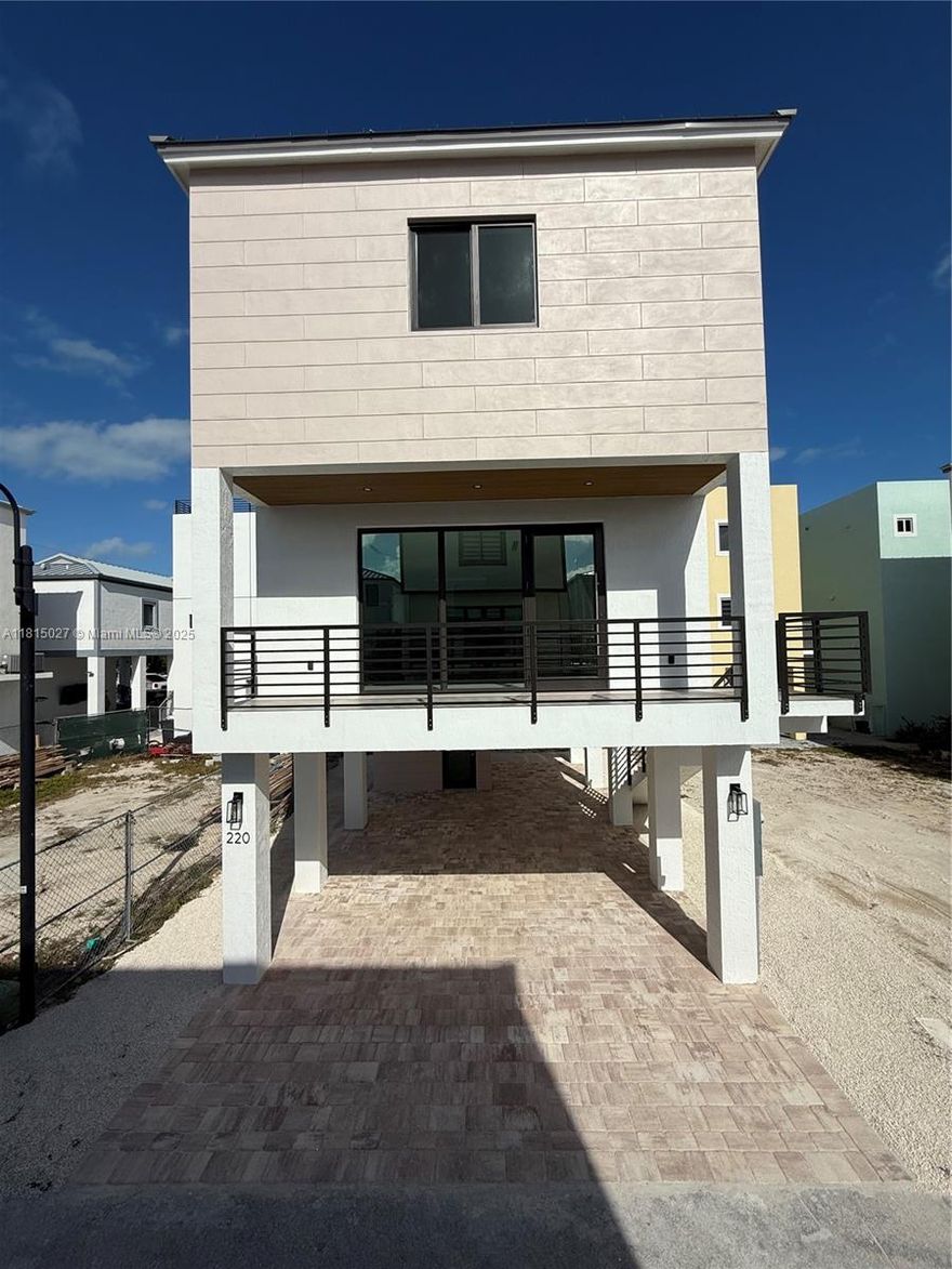 Brand New Construction. Modern and tastefully done. Open floor plan. Beautiful kitchen perfect for entertaining with book matched countertops, tray ceiling island with stovetop and hood with accent lighting. Bar under staircase with wine cooler, niches and wood accents. Polished Concrete floors throughout. Three bedroom, 3 full bath. Primary bedroom with his and hers closets. Storage room on ground level (120sqft). Paver driveway. New gated community with pool, clubhouse, gym, playground, basketball/pickle/tennis courts, fishing pier and community ramp. Great for families. Call/text for tours Mon-Fri 8am-3pm.
Agent Remarks: Easy to show. Short notice OK. Onsite Mon-Fri 8am-3pm. Text for showings.