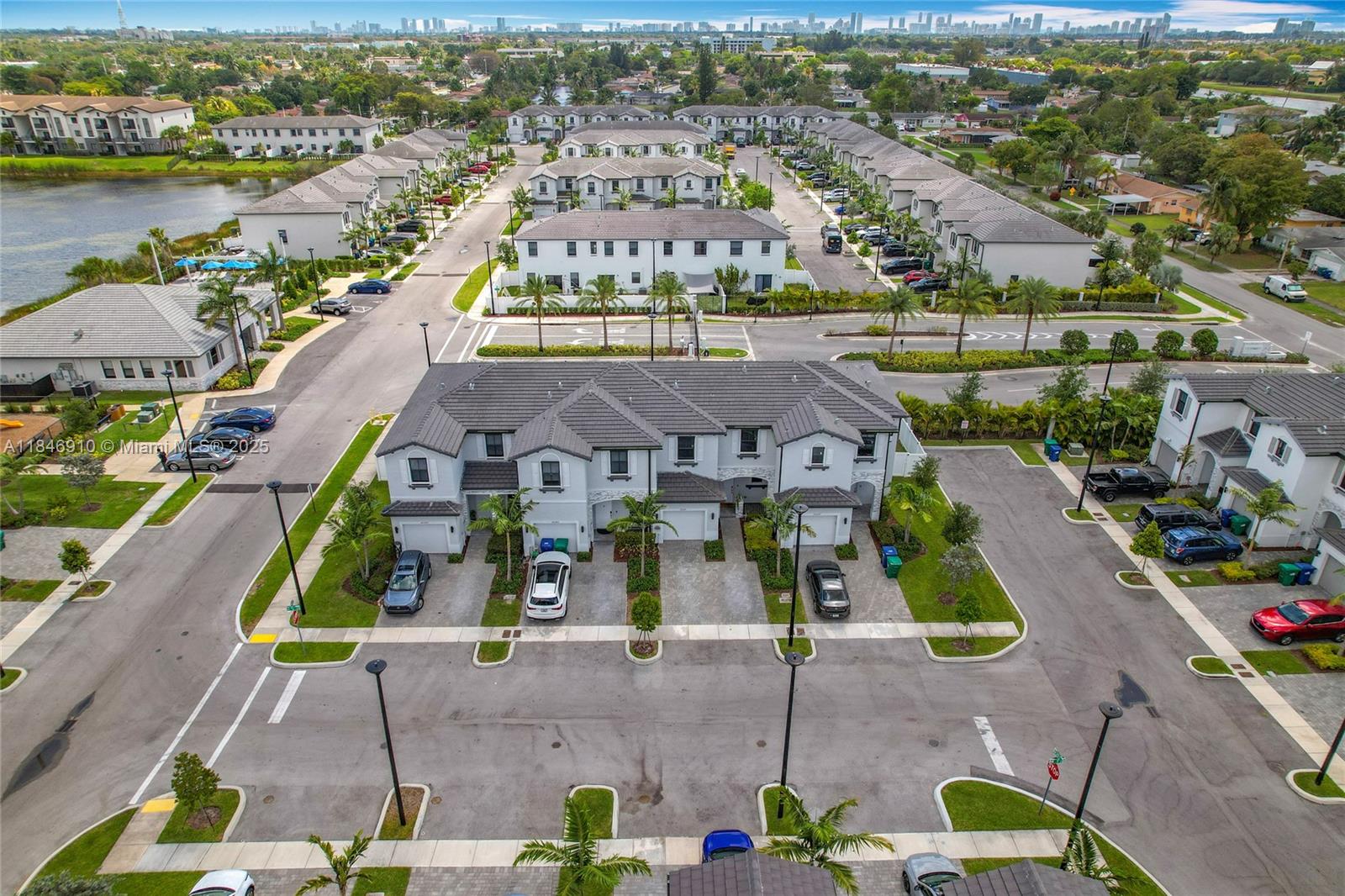 Welcome to your dream home in the gated Viewpoint at Vista Lago, Miami Gardens! Built in 2022, this 3-bed, 2.5-bath townhome offers 1,344 sq ft of modern living with a 1-car garage, 2-car driveway, fenced backyard, and deck. The open kitchen features granite counters, stainless steel appliances, and flows into spacious living areas. Upstairs: 3 bedrooms, walk-in closet, ensuite bath, stacked W/D, and storage galore. Smart Home system with Ring, Flo by Moen, and hurricane shutters included. Community perks: pool, clubhouse, gym, and playground. Minutes to Aventura, beaches, Hard Rock Stadium, and major airports. Easy living in a vibrant, connected neighborhood!