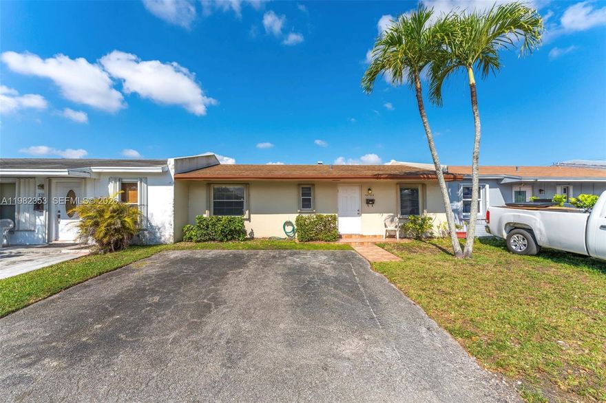 Move-In Ready Starter Home - Awaits Your Personal Touches. New ROOF (2021). Updated PVC Plumbing. Freshly Painted Interior. Hurricane Shutters Throughout. Large Backyard & Covered Terrace Perfect for BBQ's. Huge Common Green Space Behind Fence... more space for the kids to play! Spacious Laundry/Utility Room with Storage. 2 Car Driveway & Many Guest Spots. Extremely Low HOA (less than $170/YEAR). Highly sought-after location close to FIU, Dolphin Mall, MIA International Airport, Major Expressways, great schools, hospitals, parks & so much more. Priced to sell. AS-IS.