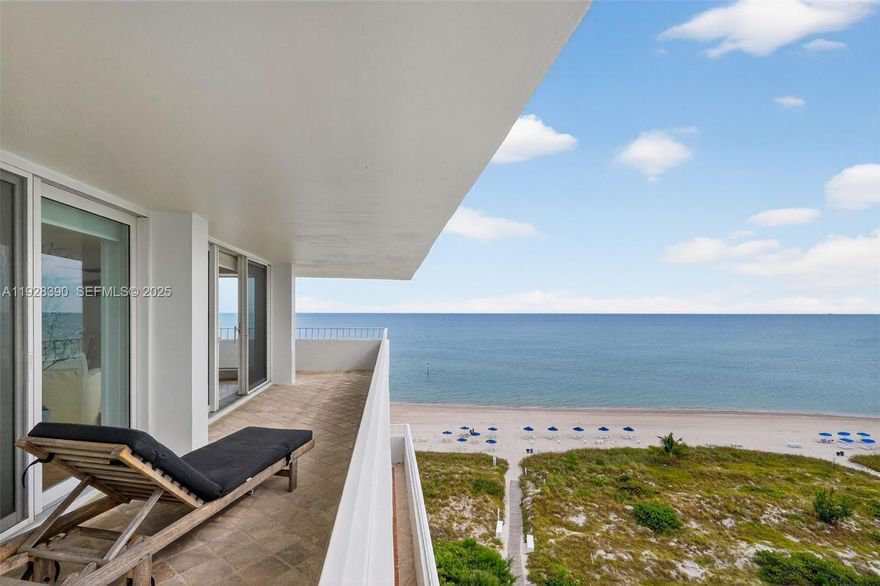 Stunning oceanfront southeast corner condominium featuring 3 bedrooms and 2½ bathrooms. A spectacular wrap-around balcony offers direct, unobstructed views of the Atlantic Ocean. Beautifully remodeled with wood flooring throughout and impact-resistant doors and windows. The open-concept kitchen is equipped with stainless steel appliances, a wine cooler, and abundant custom cabinetry. All three spacious bedrooms open directly to the wrap-around balcony. Washer and dryer conveniently located in the residence. Building amenities include direct beach access, a heated pool, gated entry, and tennis courts.