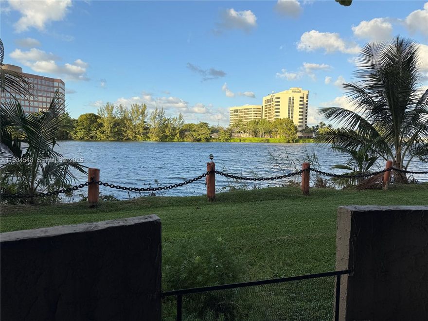 Beautiful lakefront first-floor condo in a desirable 5-story building, offering 2 bedrooms and 2 full bathrooms. Enjoy tranquil water views with convenient ground-level access—no stairs or elevators required. Bright open living and dining areas with serene lakefront surroundings. Ideally located near Miami International Airport and major expressways, providing easy access to shopping, dining, and downtown Miami.