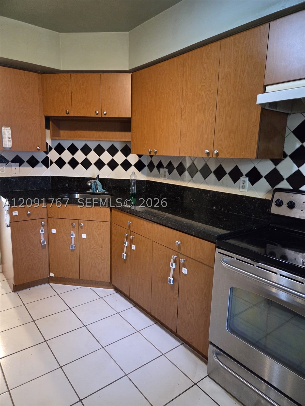 9101 W Sample Rd 102, Coral Springs FL 33065