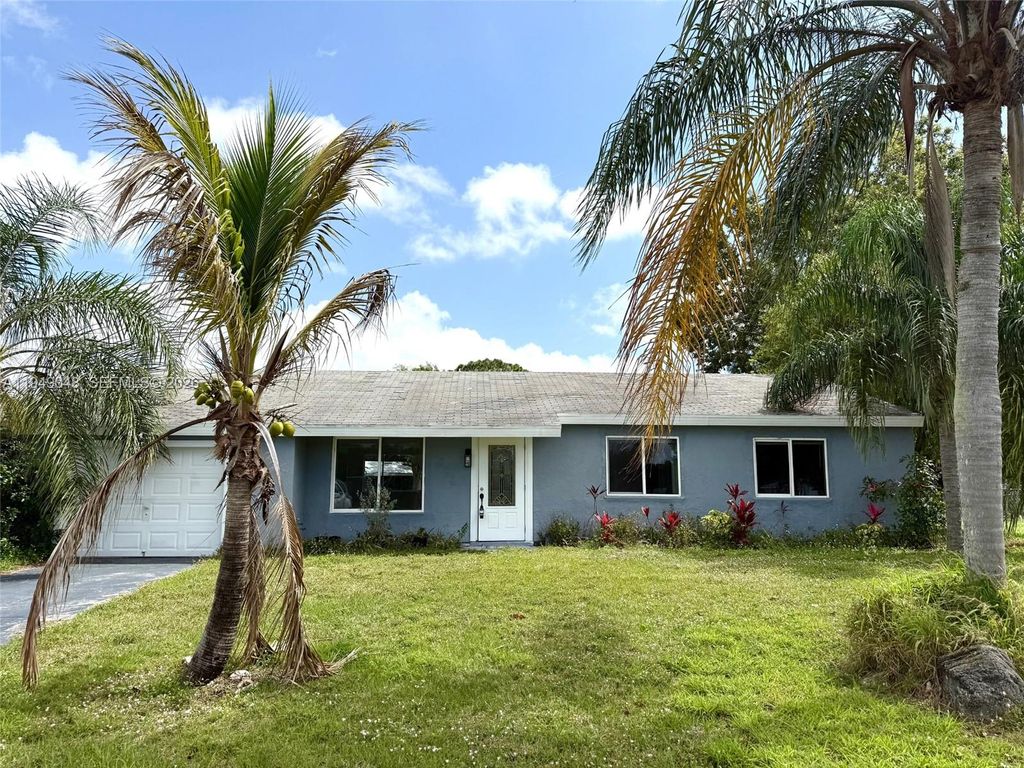 Photo of 3311 SW Ensley Ct, Port St Lucie, FL 34953 (MLS # A11949048)