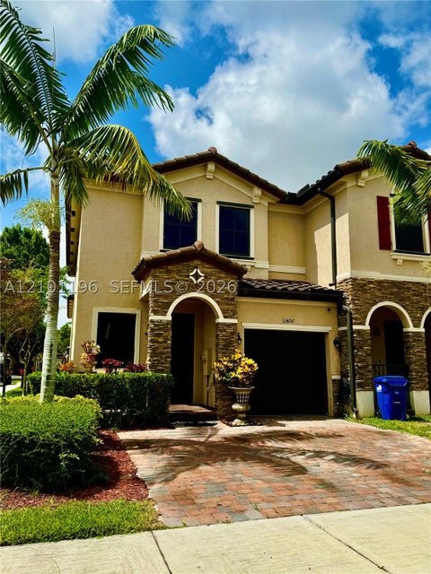 Photo of 11406 SW 252nd Ter, Homestead, FL 33032 (MLS # A12101196)