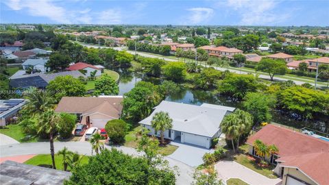 Photo of 4808 Mango Dr, Tamarac, FL 33319 (MLS # A11836569)