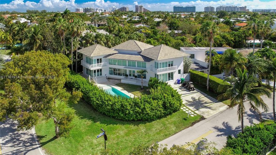 SPACIOUS & BRIGHT!!!! Located on prestigious Harbor Dr., sitting in an oversized CORNER lot of 8100 sq ft. With natural light everywhere, the house has 4000 sq ft covered. 4 bedrooms with 3 full baths on the second floor. Living area, formal dining room, playroom or media room, one full bath, ample kitchen, maids room with full bath on the entry floor. 2 garden areas. Pool. ALL IMPACT WINDOWS.