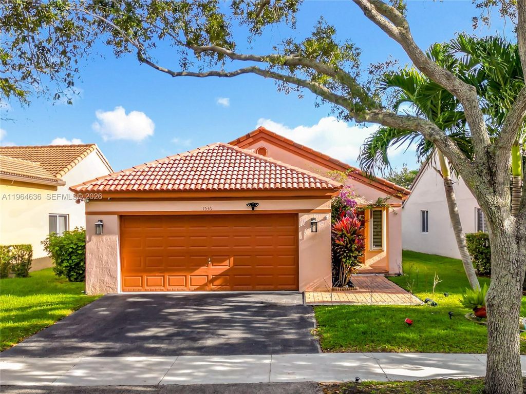 Photo of 1536 Presidio Dr, Weston, FL 33327 (MLS # A11964636)