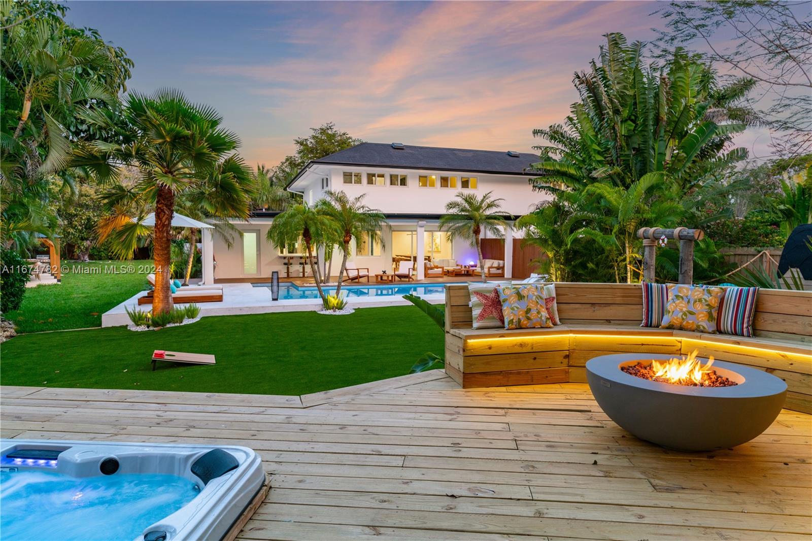 Welcome to your private turnkey paradise! Tastefully decorated & fully furnished. Also an amazing Airbnb opportunity. This stunning 3,402 SQFT estate on a huge 25,401 SQFT lot in a serene cul-de-sac boasts 6 beds & 4 baths (2 beds & 2 baths conveniently on the 1st floor). Top quality finishes & No expense was spared. Home offers an inviting kitchen, a chic primary suite, glass wine cellar, saltwater pool, impact windows, smart-home features including cameras, Sonos sound system, a Tesla car charger & an oversized driveway. The backyard is an entertainer's dream where you will never want to leave! Every detail was perfectly thought out featuring multiple sitting areas & ambiences including firepits, a jacuzzi, barrel sauna, green area with artificial grass & even a sand area. A must see!