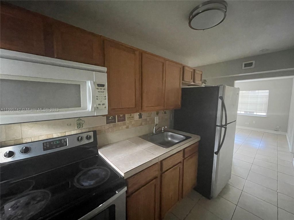 Photo of 2821 NW 12th Ct #1, Fort Lauderdale, FL 33311 (MLS # A11395742)