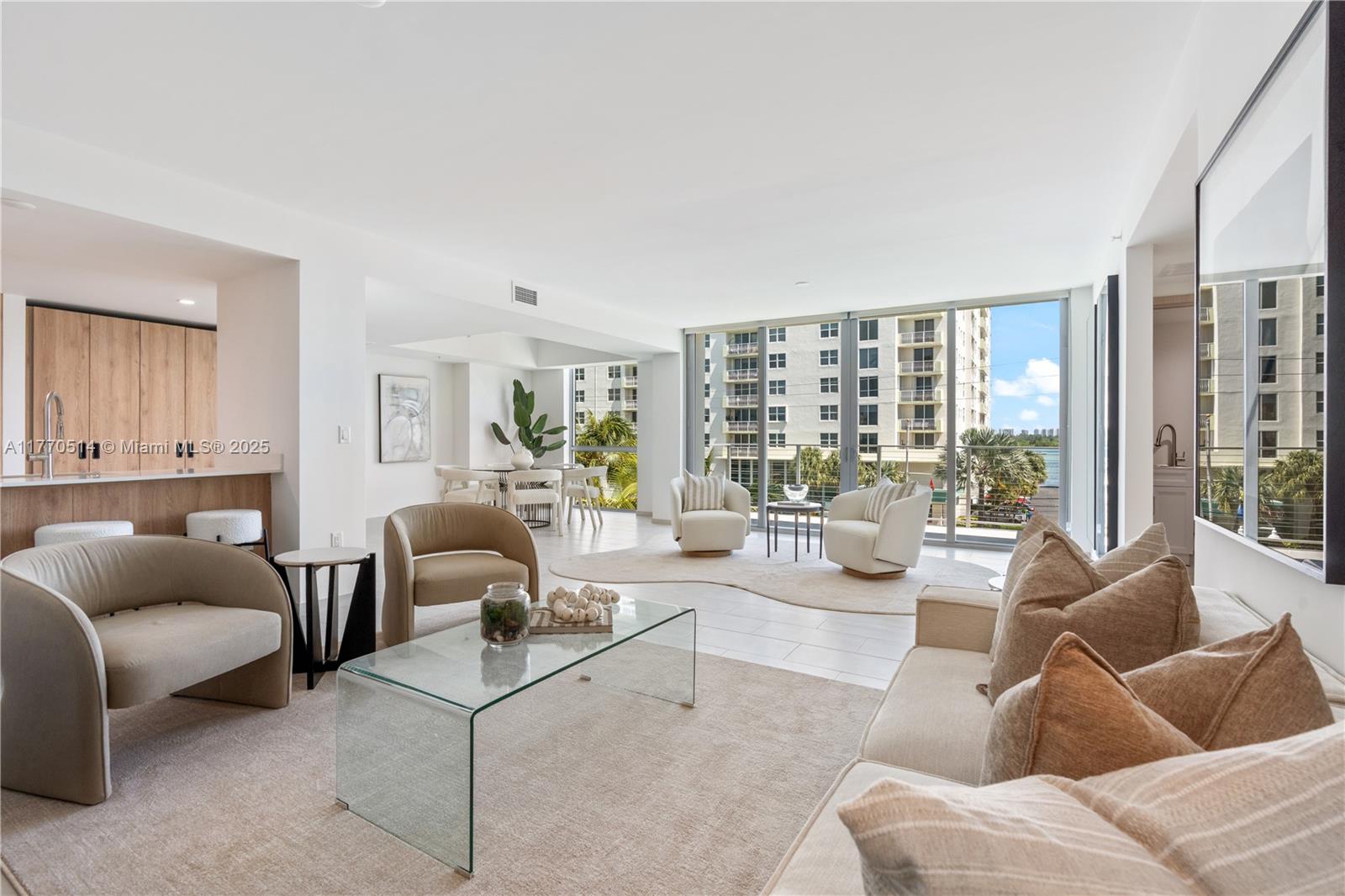 New construction on Bay Harbor Island, where land is scarce, SOTE offers luxurious island living with modern amenities. This 4-bedroom plus office, 4.5-bathroom home blends nature and contemporary design, featuring an open-concept layout, exceptional finishes, spa-like bathrooms, floor-to-ceiling glass walls, and outdoor terraces. Outside, enjoy a rooftop pool, private cabanas, jacuzzi, waterfall, and entertainment area. A Peloton-powered gym, storage unit, and atrium filled with greenery provide wellness and relaxation, offering a serene escape from daily life. All of this, just steps from the best of modern conveniences.