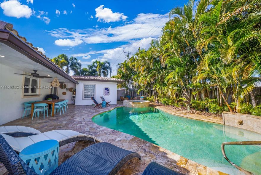 Beautiful custom home in Imperial Point.Only 2.5 miles to the beach! The spacious layout is perfect for large families or groups.This spacious 3-bedroom tropical oasis pool home, 2 car garage with the laundry room.Extra Large master bedroom. Master bath has a separate spa tub, full sit-down shower, water closet and cabana door to pool area. Large living area. Lounge by your private heated pool and cook BBQ, or hit the beach.Privately fenced backyard with multiple patio areas. Located in East Fort Lauderdale near everything you need: shopping, dining and beach corridor. Located in one of the most walkable neighborhoods in the area.