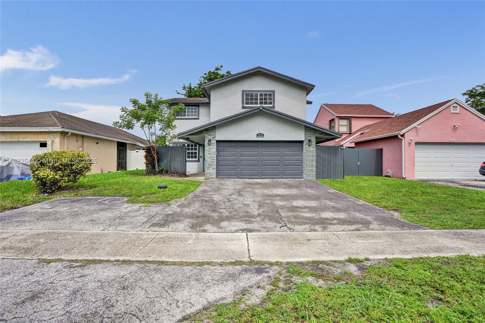 Welcome to one of the best value homes! Just minutes from the Sawgrass Expressway. This property blends comfort, style, and function. It features 4 bedrooms, 2.5 baths, a large primary suite with an updated bath, and a remodeled modern kitchen with sleek stainless steel appliances and a large island opening to a bright, airy floor plan with plenty of room for a large family. A spacious den offers flexibility for an office, playroom, or media room. Updates include A New A/C unit, Refreshed Bathrooms, Impact Windows, Elegant Plantation Shutters, and a Smart System for Lighting, A/C, and Door locks. Outside. Enjoy a large backyard with an oversized wood deck, plus a double swing fence for boat or trailer storage. Best of all—no HOA! This home truly has it all! Don't miss one!