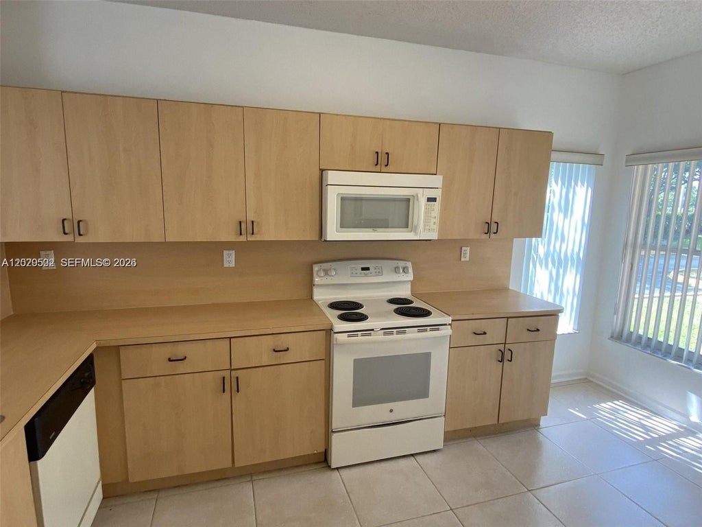 Photo of 7980 S Southwood Cir #0, Davie, FL 33328 (MLS # A12029502)
