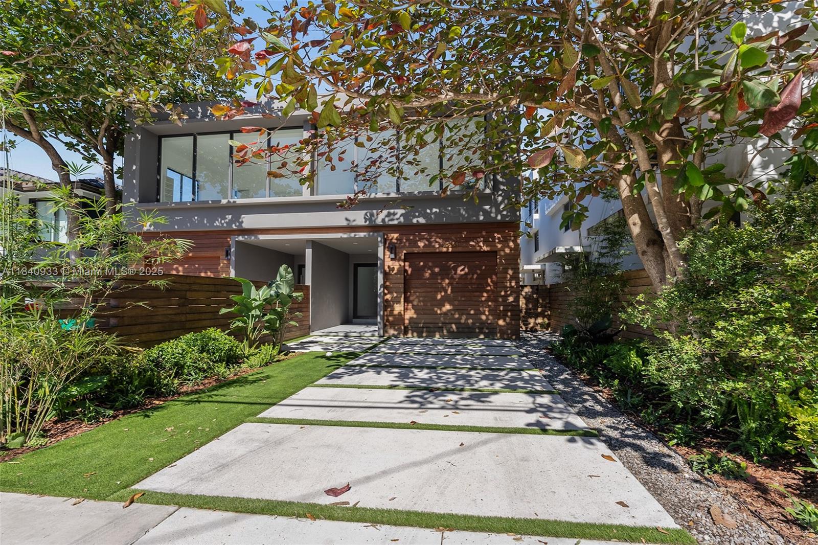 New construction modern townhome in the heart of Coconut Grove. This two-level residence (4BR/3.5BA) offers light-filled, open living spaces w/volume ceilings, high-end finishes and fixtures throughout. Stunning, European-style kitchen with all Bosch appliances, quartz countertops & cooking island w/seating. All bedrooms offer ample closet space and some have balconies. Luxurious primary suite offers floor- to-ceiling windows w/tree-top views, oversized custom walk-in closet and spa-like bath w/soaking tub & frameless glass rain shower. Enjoy outdoor living & entertaining in the private garden with tranquil pool and 1,000 sq ft rooftop terrace with full summer kitchen. Just a walk or bike ride away from the Grove's best restaurants and shops.