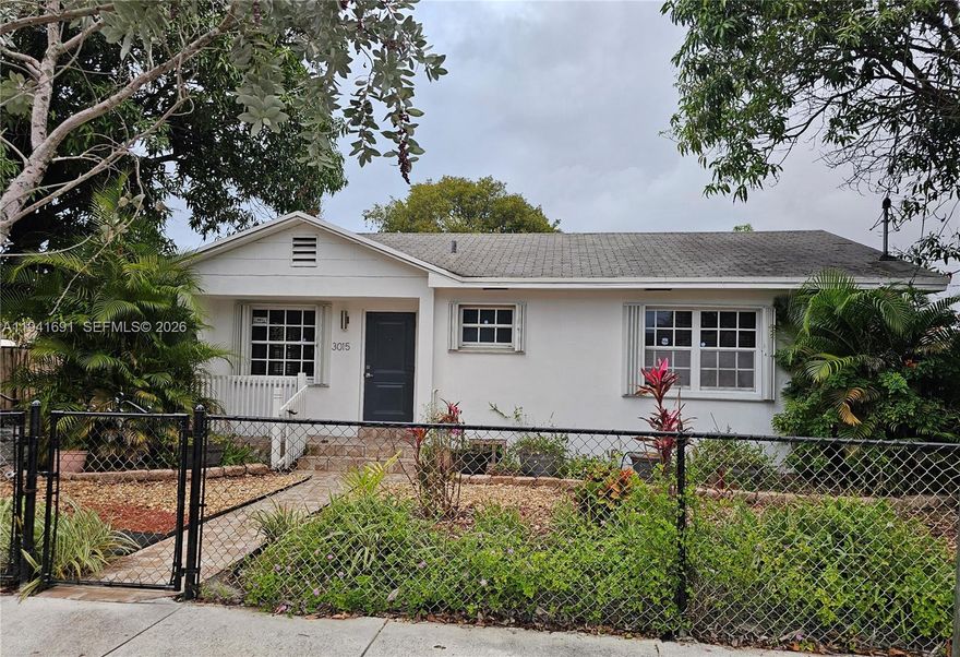 Well located Pines neighborhood property west of Silver Bluff, offering T3-O zoning with land use allowing duplex development (5700), just minutes from Coconut Grove, Coral Gables, Brickell and Downtown Miami. The surrounding area is rapidly evolving with new construction and higher value homes, making this a prime location for long term appreciation. The home features a solid CBS structure with a versatile layout, including a private-entry  suite with bathroom and walk in closet.  Ideal for multigenerational living, home office use, or guest accommodations. The main living areas provide over 1,400 square feet of functional space, ready for personalization. The updated kitchen features white shaker cabinetry, marble stone counters, a built-in cooking island, pantry, and modern lighting. Bathroom has been updated and includes a walk-in shower with stacked large-format porcelain tile, safety grab bars, contemporary lighting and wood-look plank tile flooring. The home also includes a newer (2024) HVAC system. Attic framing is constructed of original Dade County pine and is in excellent condition. A long private driveway and detached one-car garage provide excellent parking and storage flexibility. The property is being sold As-Is and presents an outstanding opportunity to add cosmetic touches and create a personalized Miami residence in a high-demand central location. Easy to show. Use Showing Time or text agent.