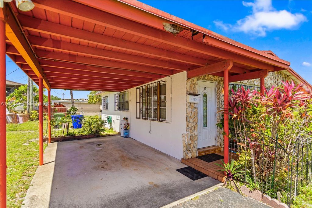 Photo of 1711 NW 26th Ave, Fort Lauderdale, FL 33311 (MLS # A12005594)