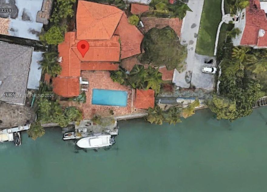 Exceptional waterfront opportunity in Mid-Beach, steps from St. Patrick’s, nestled on a quiet dead-end street. This 2-story residence offers over 5,000 sq ft with 6 bedrooms, 7 bathrooms, and a private office. Boasting 106 feet of canal frontage — well above average — on an 11,300sft lot and just one fixed bridge from the Bay. Sold as-is, this is your chance to unlock tremendous value at the lowest price per sq ft in the area — renovate or rebuild your dream waterfront estate. The lush grounds feature mature avocado, mango, and lychee trees, adding charm to this diamond in the rough. This much water frontage at this price point in Mid-Beach is exceptionally rare. Don’t miss your chance to own and transform one of Miami’s most coveted waterfront addresses.