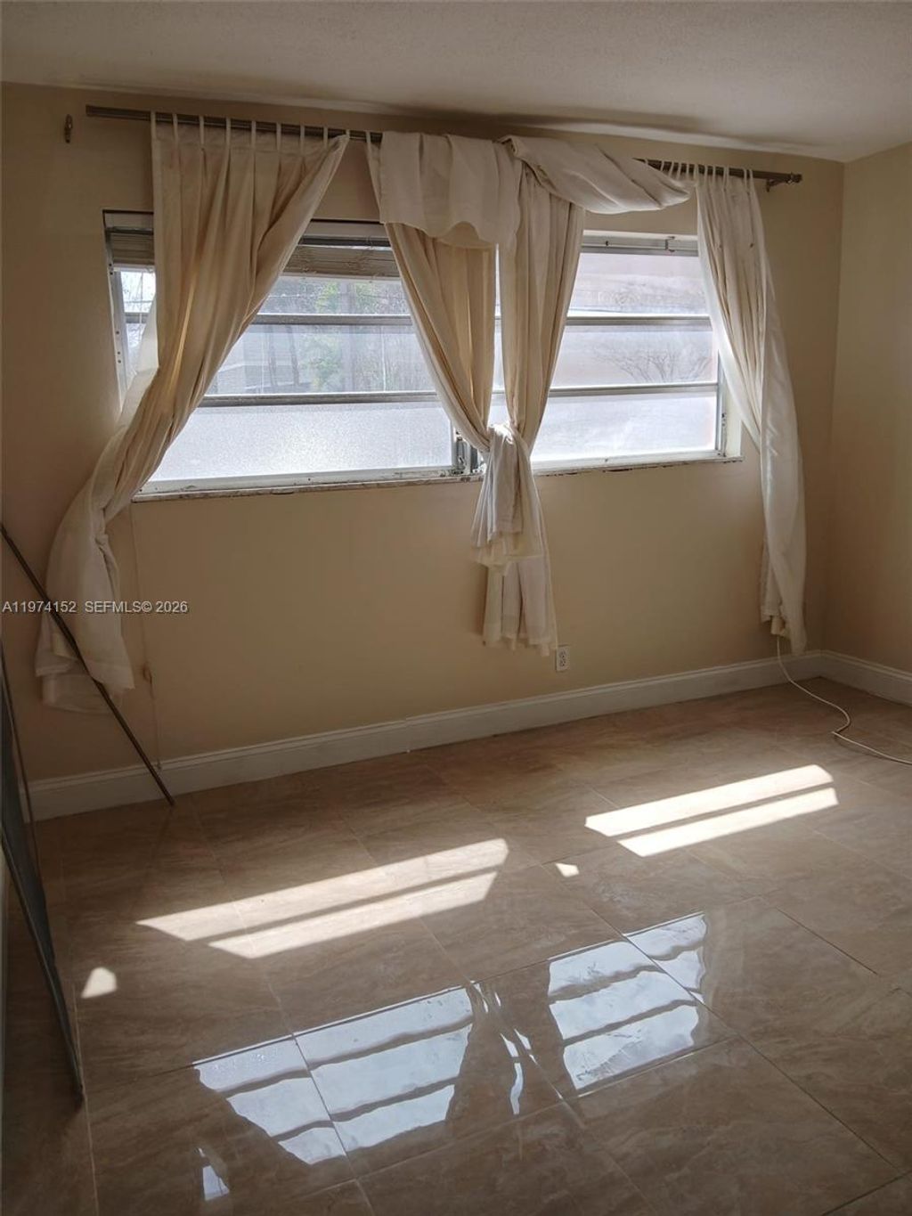 Photo of 180 NE 12th Ave #15A, Hallandale Beach, FL 33009 (MLS # A11974152)