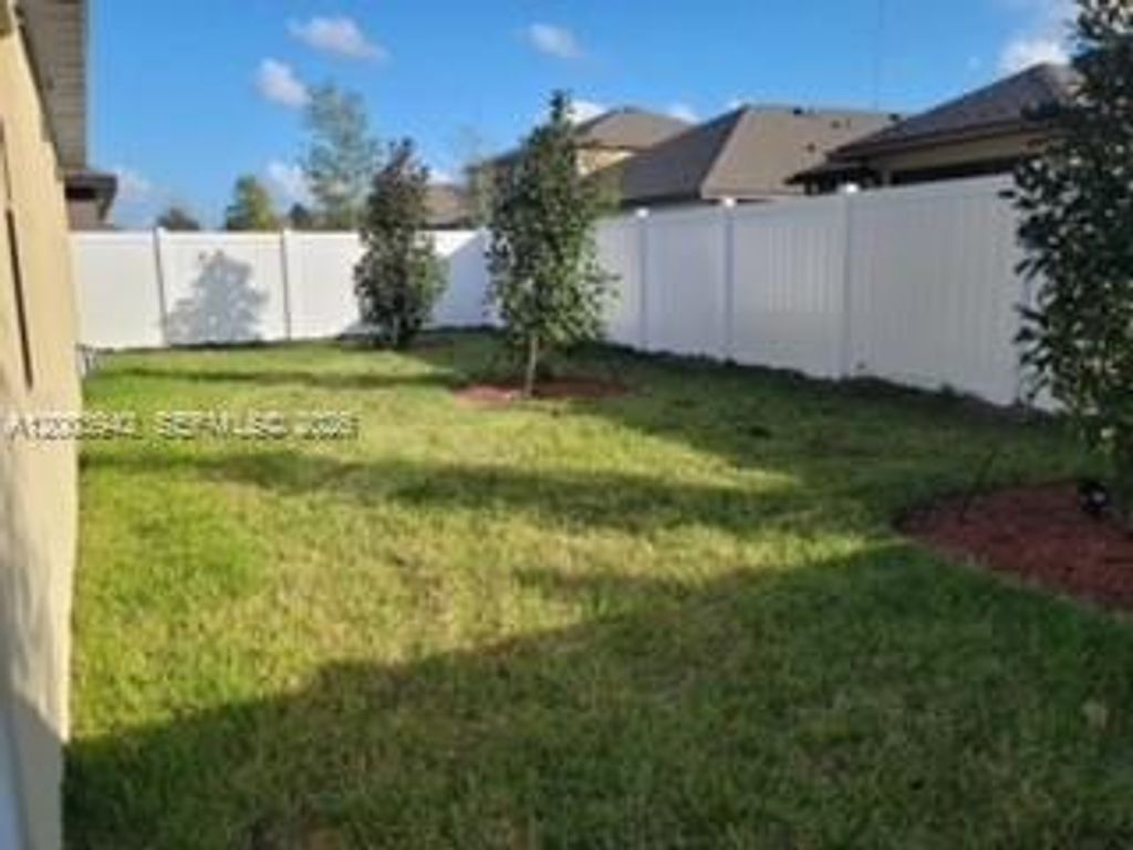 Photo of 5517 Amusement Ave, Fort Pierce, FL 34947 (MLS # A12003942)