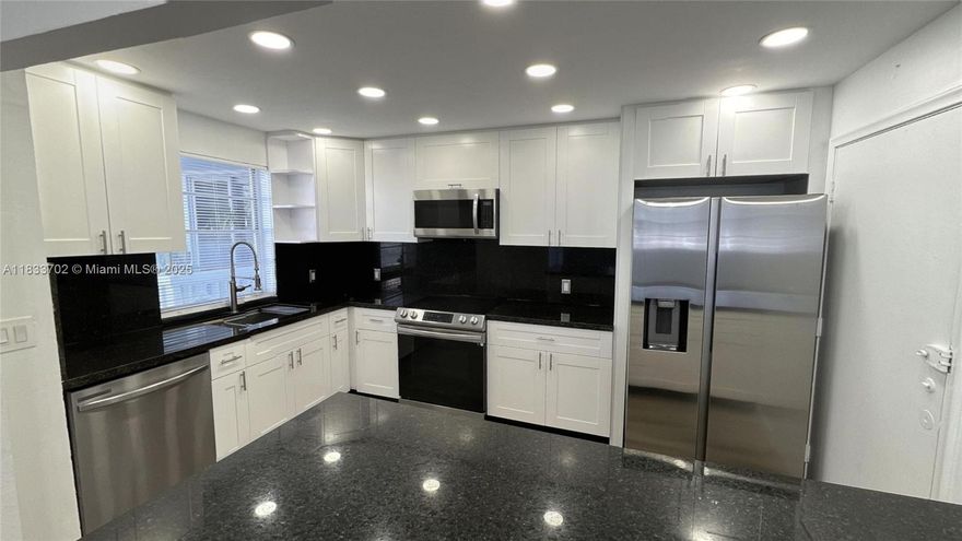 Easy to show ! Ready to move in ! Incredibly opportunity for spacious 2/2 corner unit in the most desirable area of Meridian Ave. Completely remodeled, with new Impact Windows!!!! new bathrooms, new air conditioning, new kitchen, new electrical panel, all with permits. Bright corner unit with tons of natural light/large terrace over looking the pool- large main bedroom with en-suite bath-walk in closet. Designated storage unit- Pool, assigned parking & bicycle storage Steps to beautiful Flamingo park with it beautiful tennis courts, swimming pool, basketball, and children's playground. Embrace the South Beach lifestyle in this spacious unit. The community has completed its 40-year recertification. NO Special Assessment.