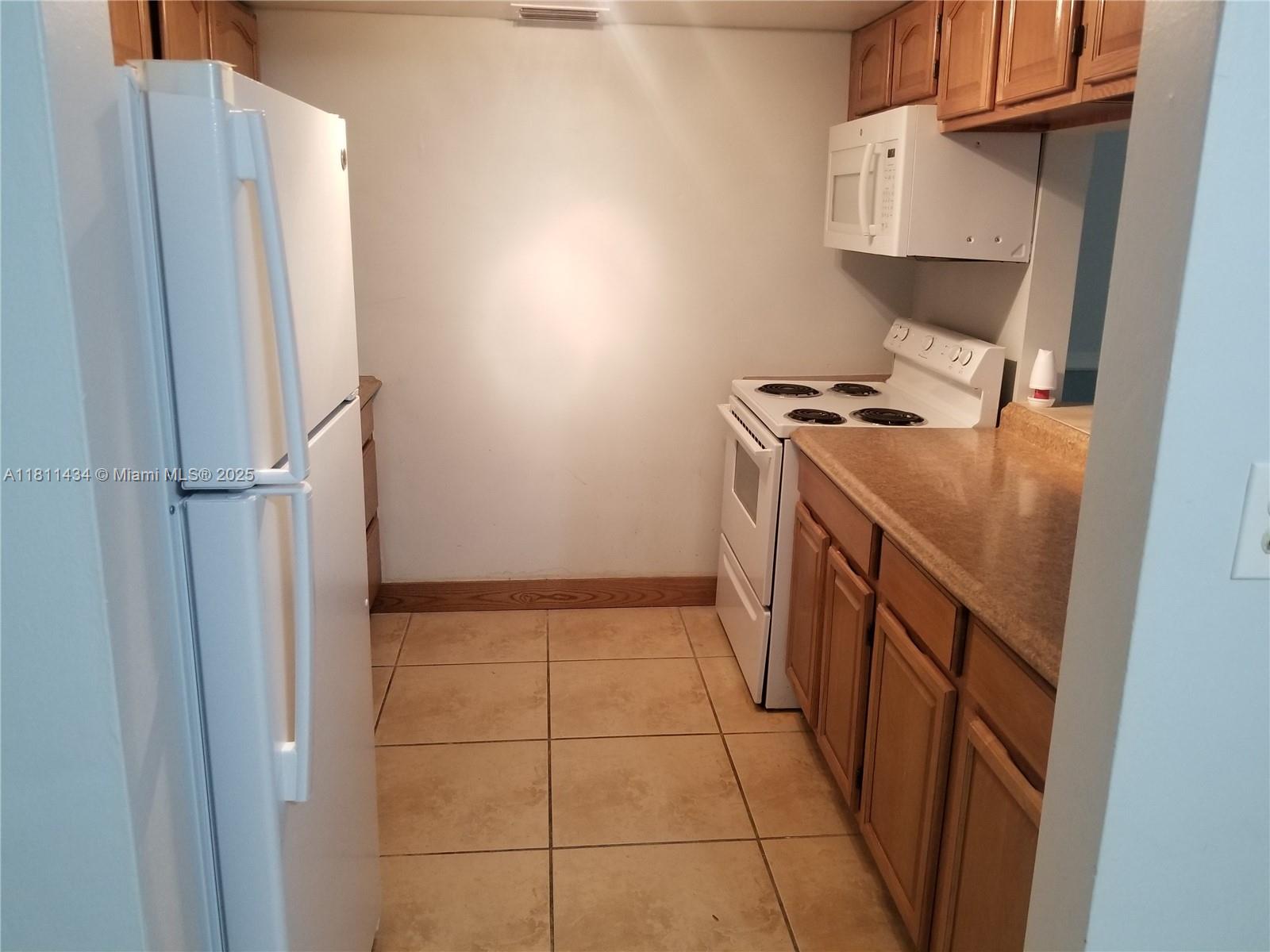 Rental Property at 11855 Ne 19th Dr 30, North Miami, Miami-Dade County, Florida - Bedrooms: 1 
Bathrooms: 2  - $1,950 MO.