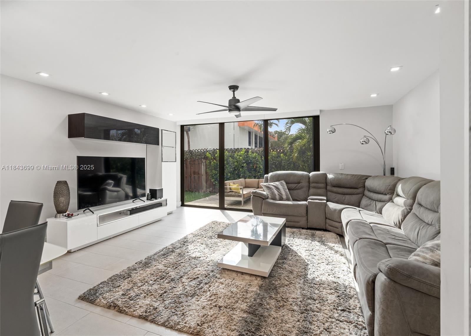 FULLY RENOVATED/MODERN 2BR/2.5BA corner townhouse in East Fort Lauderdale, zoned for desirable Harbordale Elementary. This unit has an oversized PRIVATE wraparound yard with turf, stamped concrete deck and new landscaping. Open floor plan perfect for entertaining. In the kitchen you will find Carrara quartz countertop, Samsung appliances and custom white maple wood cabinetry. Upstairs you will find a LARGE Primary bedroom as well as the secondary bedroom, both en-suite! Recent upgrades include impact glass sliding door and windows, motorized blinds, and 2 zones of A/C (Both 2023). NEW ROOF. Smart lock and video doorbell included. 2 Deeded parking spaces (fits up to 3 cars)! Boutique community with pool. Close to beaches, dining, and shopping. Available partially furnished.