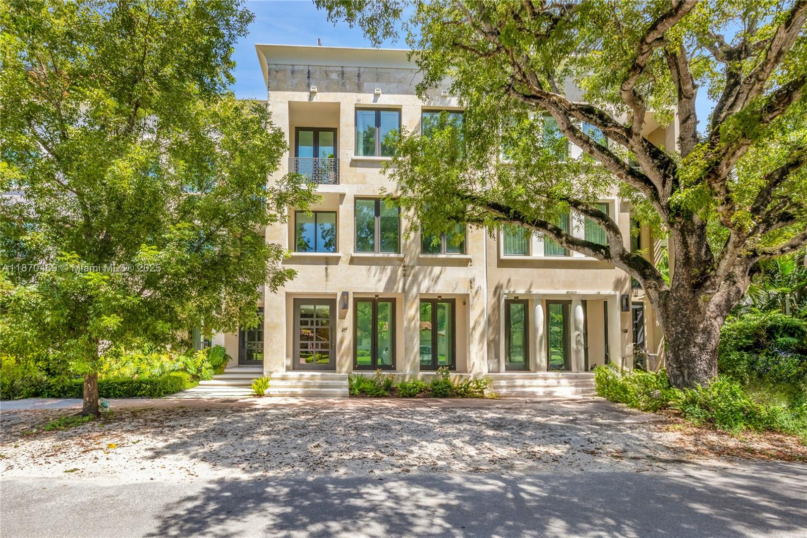 Built in 2021, this 7 bedroom, 5.5 bathroom townhouse has all of the bells and whistles of new construction, but is ready to go right now! Located in the heart of Coral Gables, the home spans 3 interior floors, plus a fabulous rooftop with private pool. The heart of the home is the kitchen with high-end appliances that opens to the spectacular family room and ultra-private interior courtyard. Located on the 3rd floor, the primary suite is a private retreat with 2 walk-in closets and Zen bathroom with dual vanities, soaking tub, and separate shower. Wonderful finishes include large format porcelain tile and wide wood plank floors, 4 car garage, laundry room, separate mud room, elevator, and impact glass windows and doors throughout.