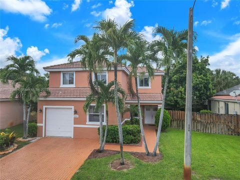 Photo of 10313 SW 16th St, Pembroke Pines, FL 33025 (MLS # A11413366)