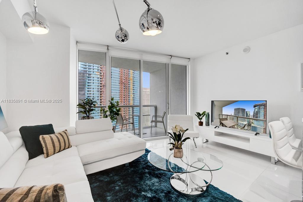 Gorgeous TURN KEY studio at Icon Brickell. One year lease only! This is a fully furnished STUDIO on a high floor with amazing views of the river. Unit offers finished closet also. RENT INCLUDES: CABLE, INTERNET, ASSIGNED PARKING AND MUCH MORE. BRAND NEW POOL! ENJOY THE BEST BUILDING AMONG BRICKELL, AMAZING AMENITIES: 2 POOLS, JACUZZI, STATE OF THE A RT FITNESS CENTER, HUGE SPA, MOVIE THEATER, PARTY ROOM, ROOF POOL PLUS RESTAURANT AND MUCH MORE !!!